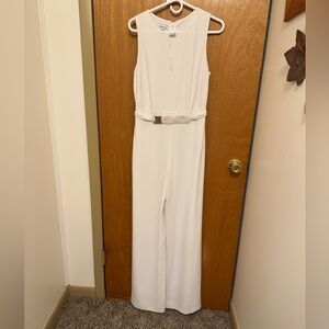 Sz 6 BeBe white belted keyhole jumpsuit very classy embellished with gold NWOT